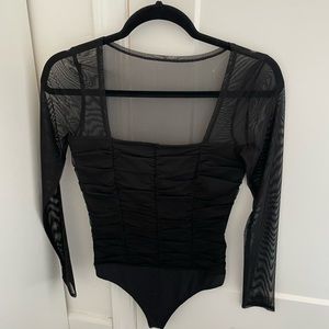 Black bodysuit with sheer sleeves